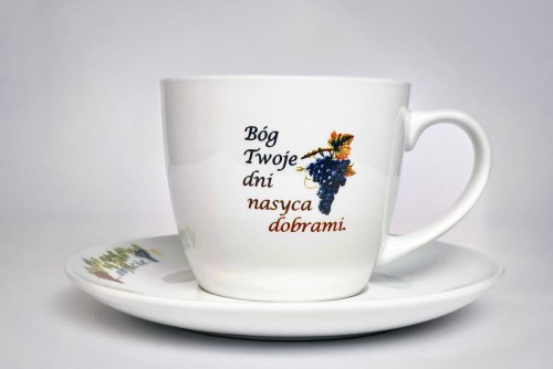 filiżanka z motywem religijnym